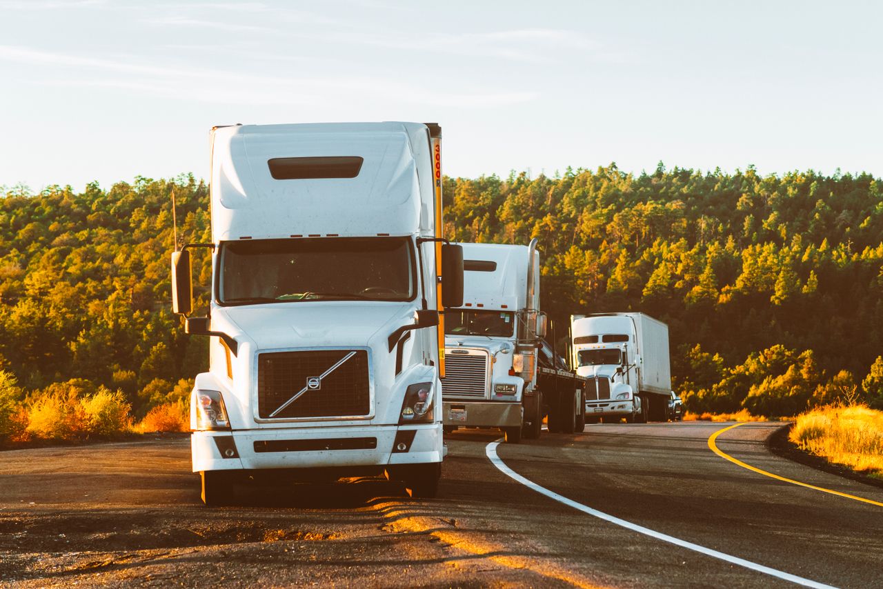 Trucks moving goods on a highway
