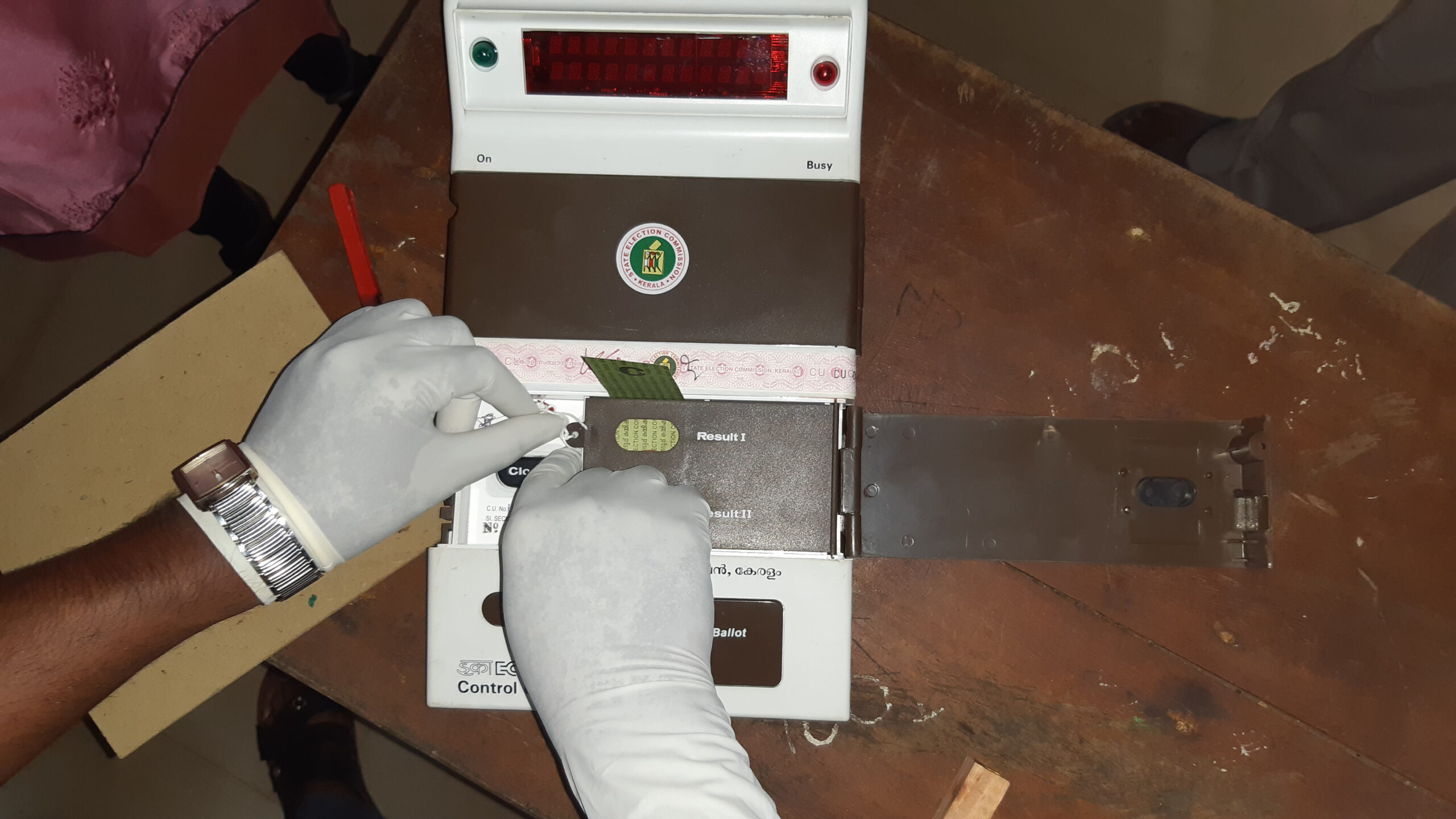 Electronic voting machine control unit on a table