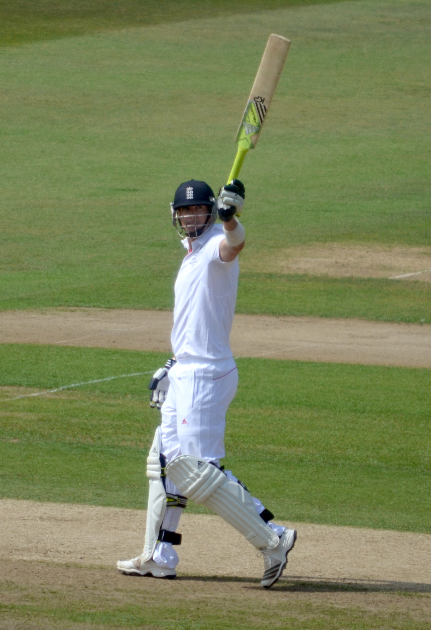 Cricket batsman playing a shot