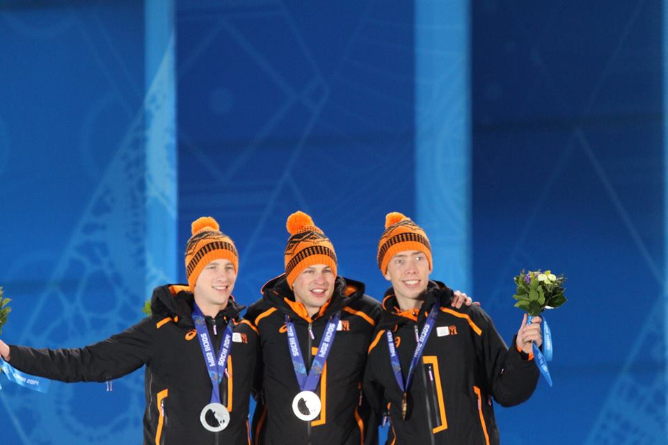 Winter Olympics podium with medals