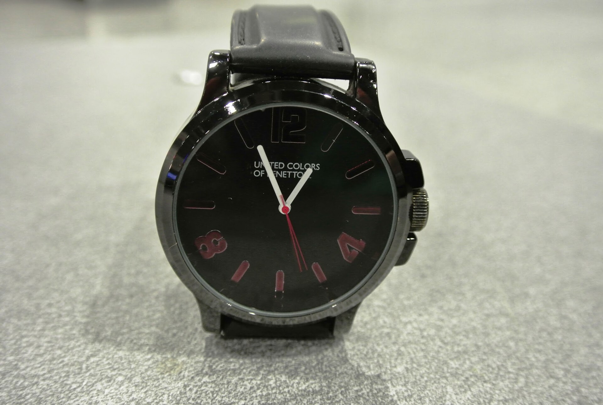 Close-up of wristwatch hands and dial