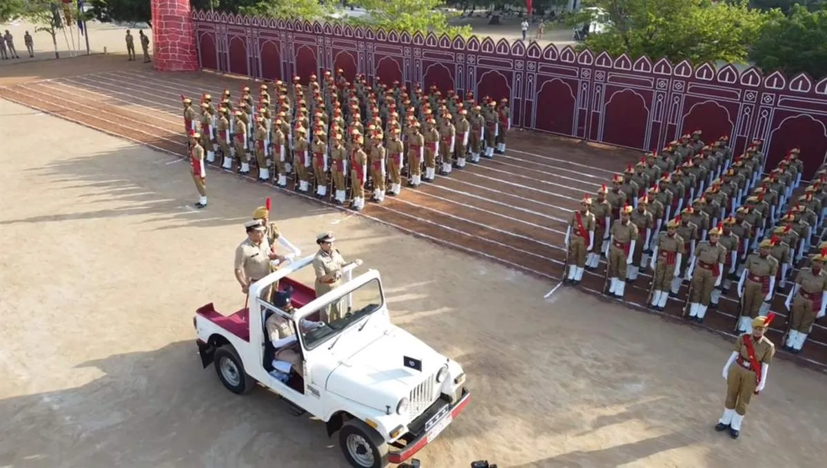 Chief guest Malini Agarwal inspects the parade from an open jeep
