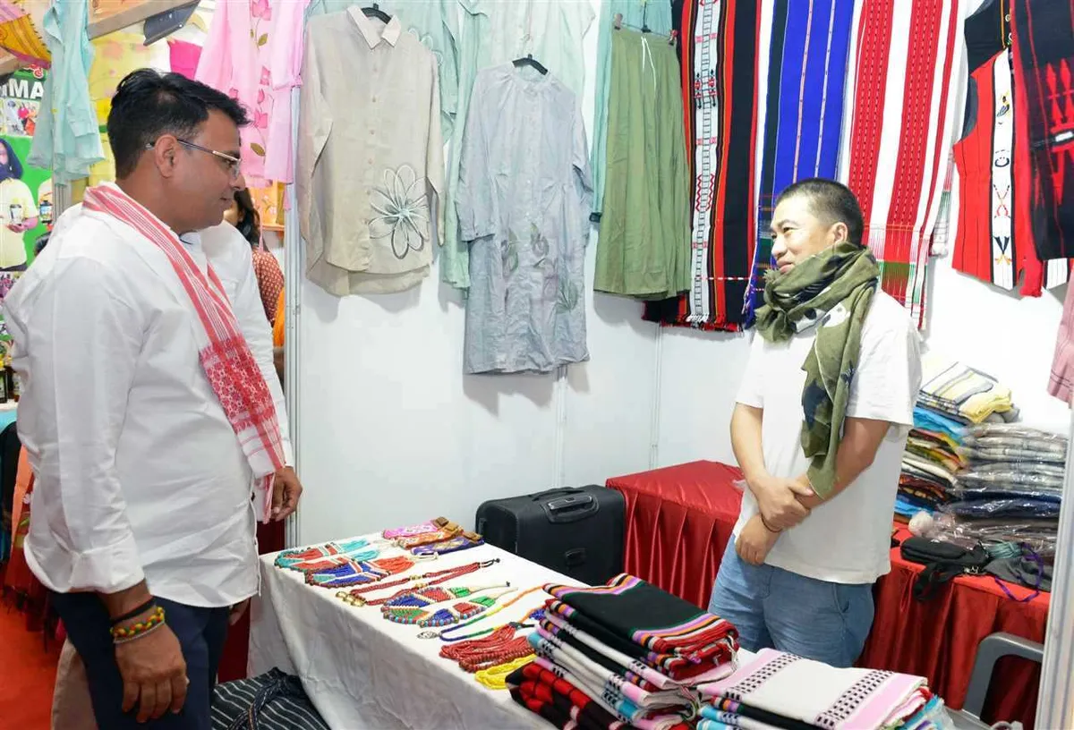 Visitors at a tribal textiles stall