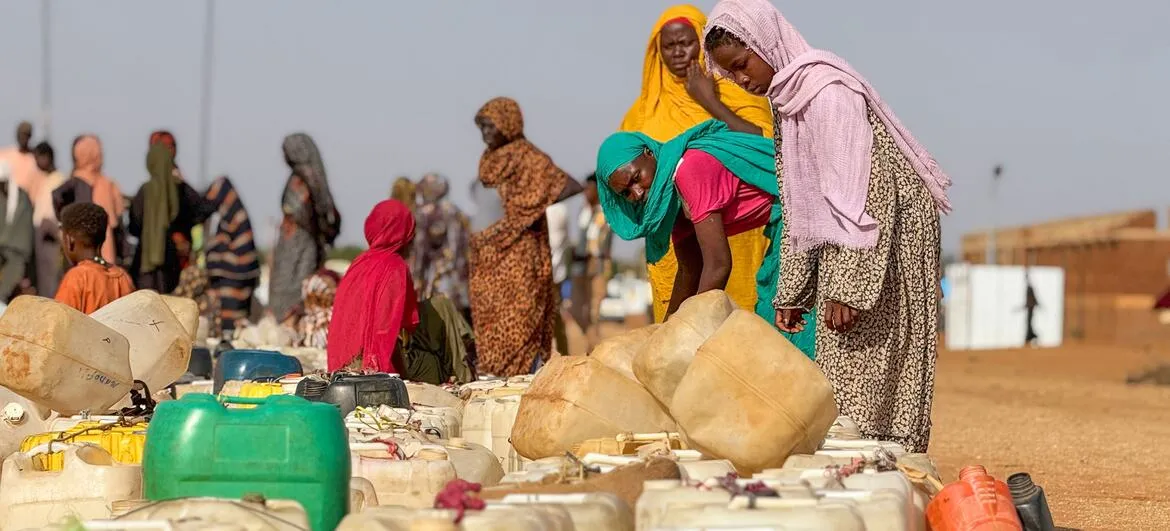 Sudan famine risk: Women and children queue for water in Al Obeid, North Kordofan