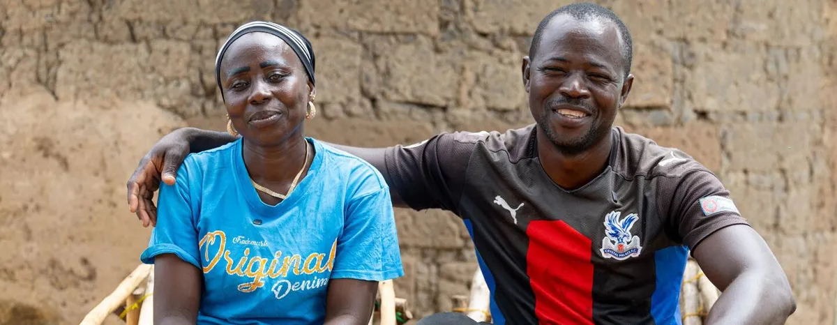 Cote d'Ivoire dam: Makongo Traoré and Adam Ouattara near her vegetable plot in Torla.
